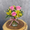 Petite, cheerful, and full of charm! Our popular Hugs and Kisses has