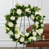 Honor a cherished life with this graceful funeral wreath that symbolizes eternal
