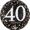 Black mylar balloon that says "40 Happy Birthday" and is covered with