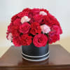 This arrangement is topped with 20-25 roses along the way of fine