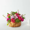 Inspired by bright shades and soft textures, this arrangement will wow your