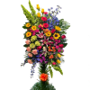 Tall mixed flower standing spray with bright roses, lilies, and gerberas