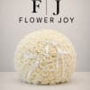 An abundant arrangement of 75 radiant white roses, designed to make every