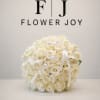 A refined bouquet of 50 fresh white roses, beautifully arranged with delicate