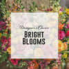 Bright mixed flower arrangement with roses and snapdragons