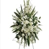 Tall white floral standing spray on an easel