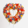 Celebrate a beautiful life with our Forever in Bloom Heart Wreath, a