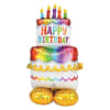 Stacked birthday balloons shaped like a cake with colorful candles
