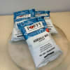 Three bags of Poppy ashville mix on a round board
