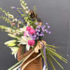 A lush hand-tied bouquet that reads like a sunlit meadow-perfect as a