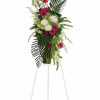 Convey your respect and admiration with this spray of striking red and