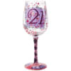 Decorated wine glass with the number 21 and pink-purple glitter accents