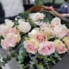 Thousand Hand-tied cluster of pale pink and ivory roses with eucalyptus, finished