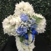 White chrysanthemum bouquet with blue carnations and ribbon