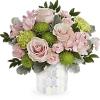 Pink roses and green mums in a patterned vase