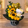 Yellow roses and sunflowers with a Hello Kitty plush and heart balloon in a black box