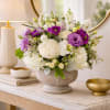 The Mia Arrangement comes in a stunning masonry pedestal container, adding an