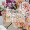 Mixed bouquet of blush, cream, and purple roses