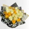 Yellow and white rose bouquet with baby's breath and a birthday topper