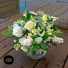 Made with whites and creams of various textures in a low clear