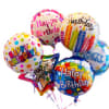 Cluster of colorful birthday balloons with printed messages