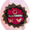 A dense cluster of vivid red roses wrapped in layered black paper