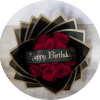 A dramatic cluster of deep red roses wrapped in sleek black packaging