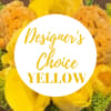 Yellow floral arrangement with a "Designer’s Choice" label