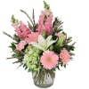 Pink and white mixed bouquet in a clear glass vase