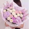 Large pastel bouquet of white roses, lavender hydrangeas, and pink flowers