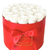 White roses arranged in a red round box with a ribbon bow