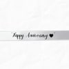 White ribbon with "Happy Anniversary" text and a heart