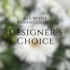 Our designers will create an all white vase arrangement using an assortment
