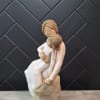 This classy figurine makes the perfect gift