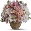 Pink and white bouquet in a decorative vase