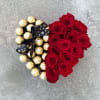Fresh red roses and chocolate in a heart box (black or red