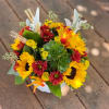 - 3 Sunflowers
- 1 Succulent 
- 2 Stems Red Cushion
-Yellow Daisies
-Dusty Miller
-Fall