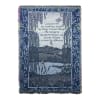 Blue woven blanket with a landscape scene and Serenity Prayer text