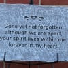 Memorial stone plaque with an engraved sympathy message