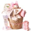 Soft blush pinks, creamy whites, and gentle peaches come together in this