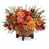 Bring warm, autumnal elegance into any space with this stunning floral arrangement.