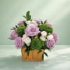 Soft lavender roses, clean white blooms, and fun pops of green in