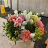 Flower basket with mixed colorful seasonal flowers. Picture is just for reference.