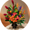 A bold, tropical centerpiece that commands attention - this tall bouquet of