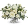 Teleflora's Arctic Blooms Bouquet captures winter's serene beauty with snowy white roses