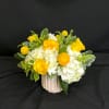 Sweet Madeline marries a cute pink ceramic vase with lovely yellow peach