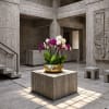 Orchid arrangement in a gold bowl on a concrete pedestal