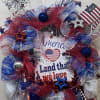 Let's celebrate America with this beautiful one-of-a-kind mesh door wreath! 