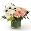 Soft pink blooms with fresh greenery designed in a delicate love filled