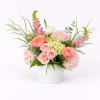 A soft and romantic arrangement designed to make a lasting impression. Featuring